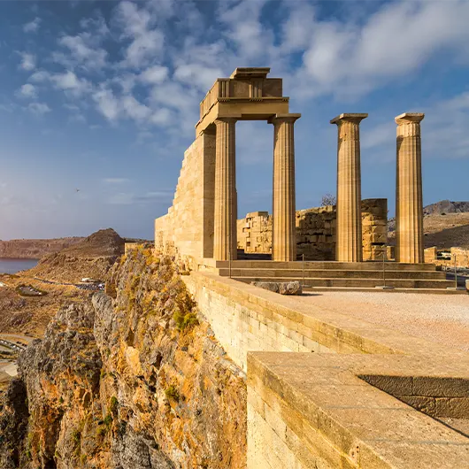 A scenic view of Ruins of Acropolis of Lindos view A scenic view of Ruins of Acropolis of Lindos view