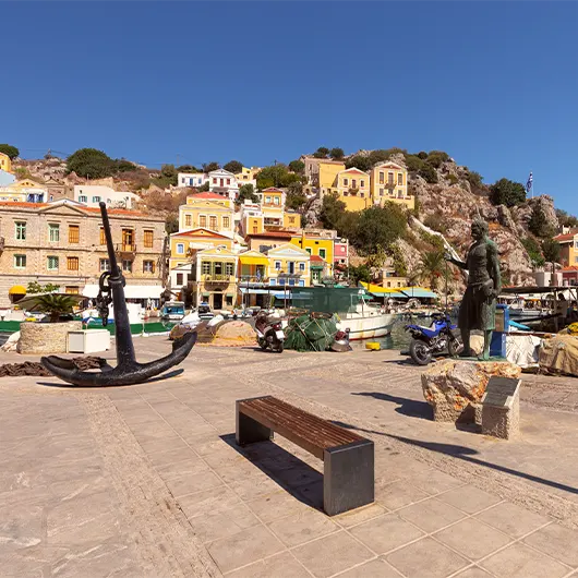 A scenic view of harbor promenade in Symi A scenic view of harbor promenade in Symi