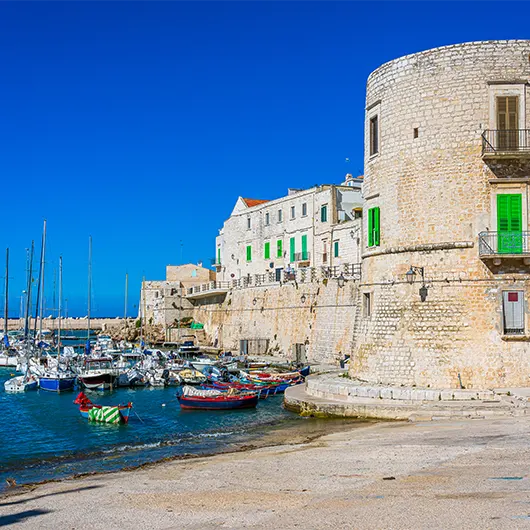 A scenic view of the beautiful waterfront of Giovinazzo A scenic view of the beautiful waterfront of Giovinazzo