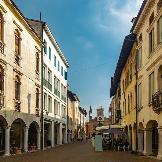 A scenic view of old town street in historical center of Pordenone A scenic view of old town street in historical center of Pordenone