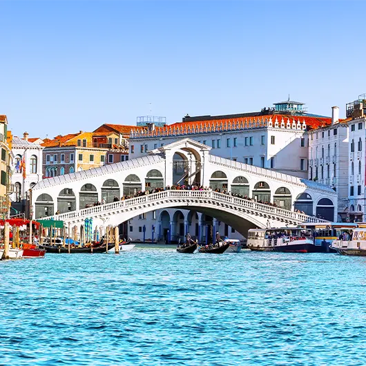 A scenic view of Grand Canal with Rialto Bridge A scenic view of Grand Canal with Rialto Bridge