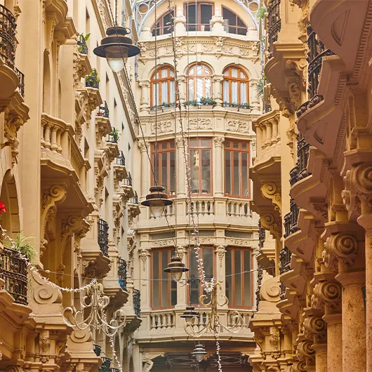 A Scenic View of historical antique buildings facades passageway A Scenic View of historical antique buildings facades passageway