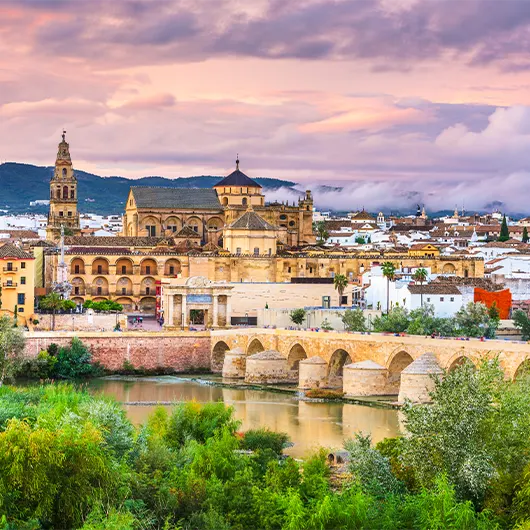 A Scenic View of Roman Bridge and Mosque-Cathedral A Scenic View of Roman Bridge and Mosque-Cathedral