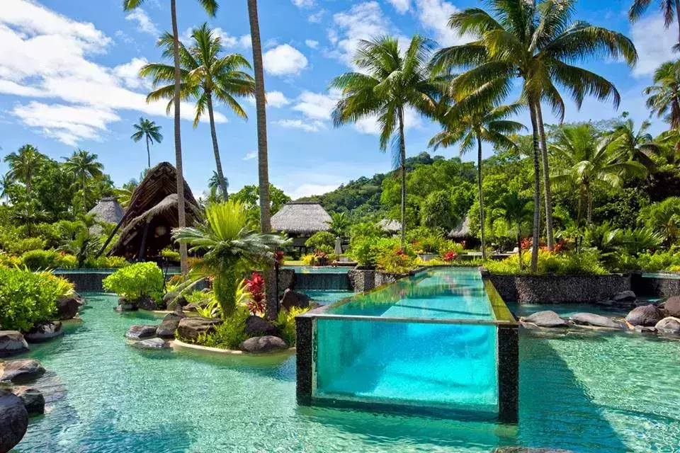 25-metre-long glass swimming pool