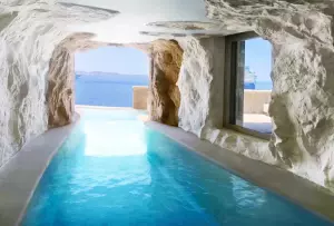 Greek Hotel’s Cave Pool Is Definition Of Honeymoon Goals