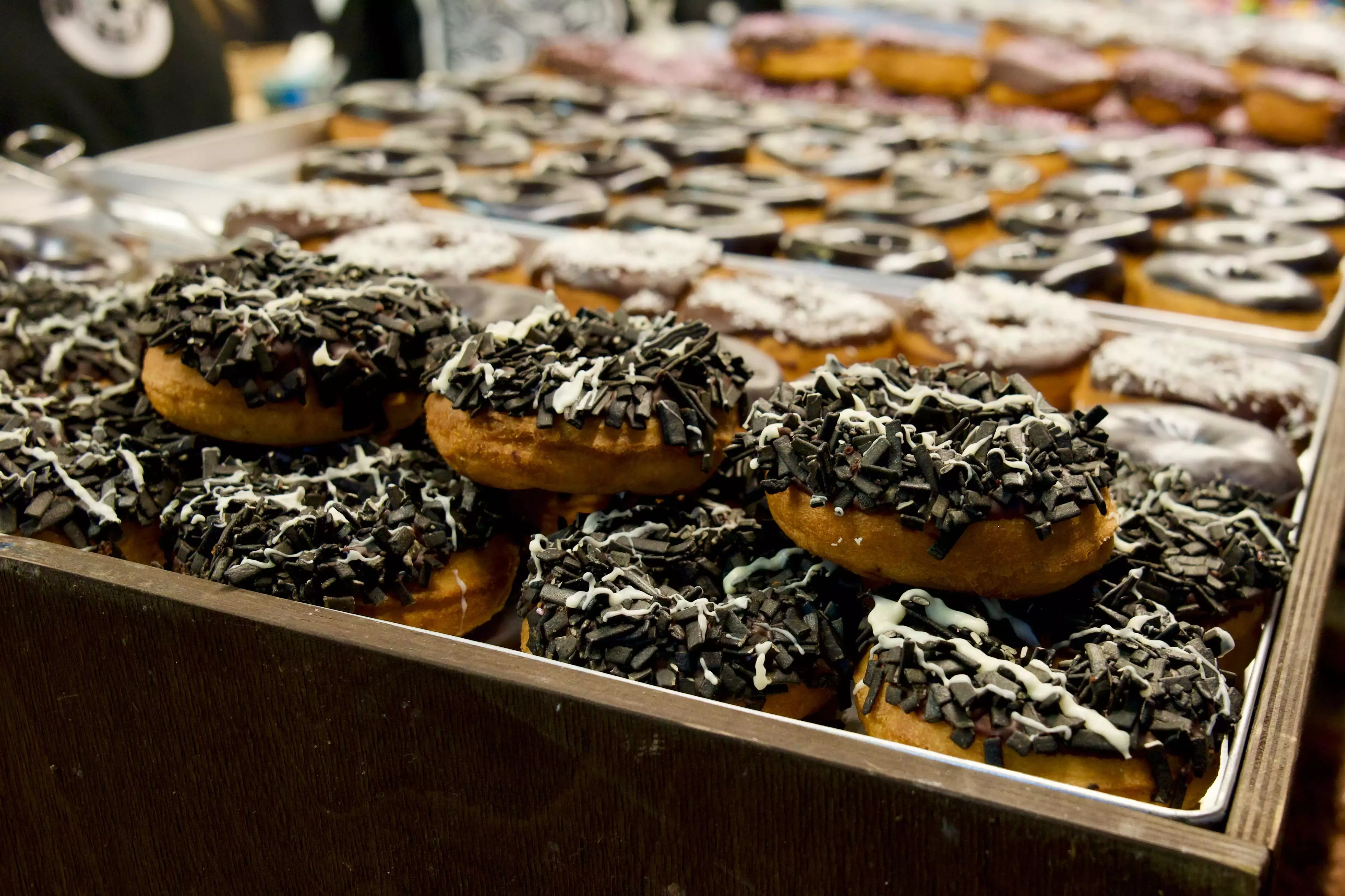 Doughnuts with a black-coloured topping at the Black Food Festival in Tallinn, Estonia.