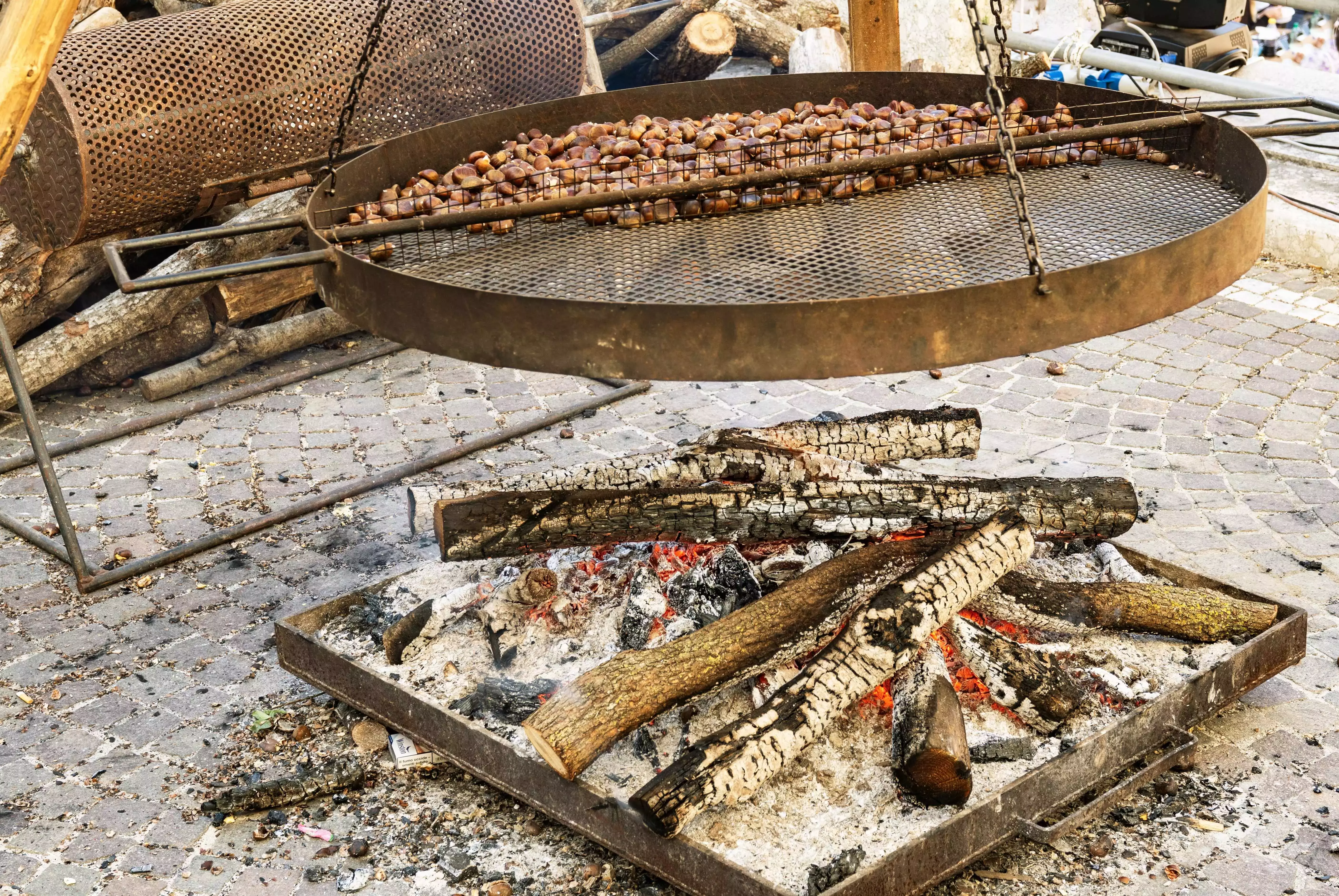 A traditional way of roasting chestnuts at the Marradi Food Festival in Italy