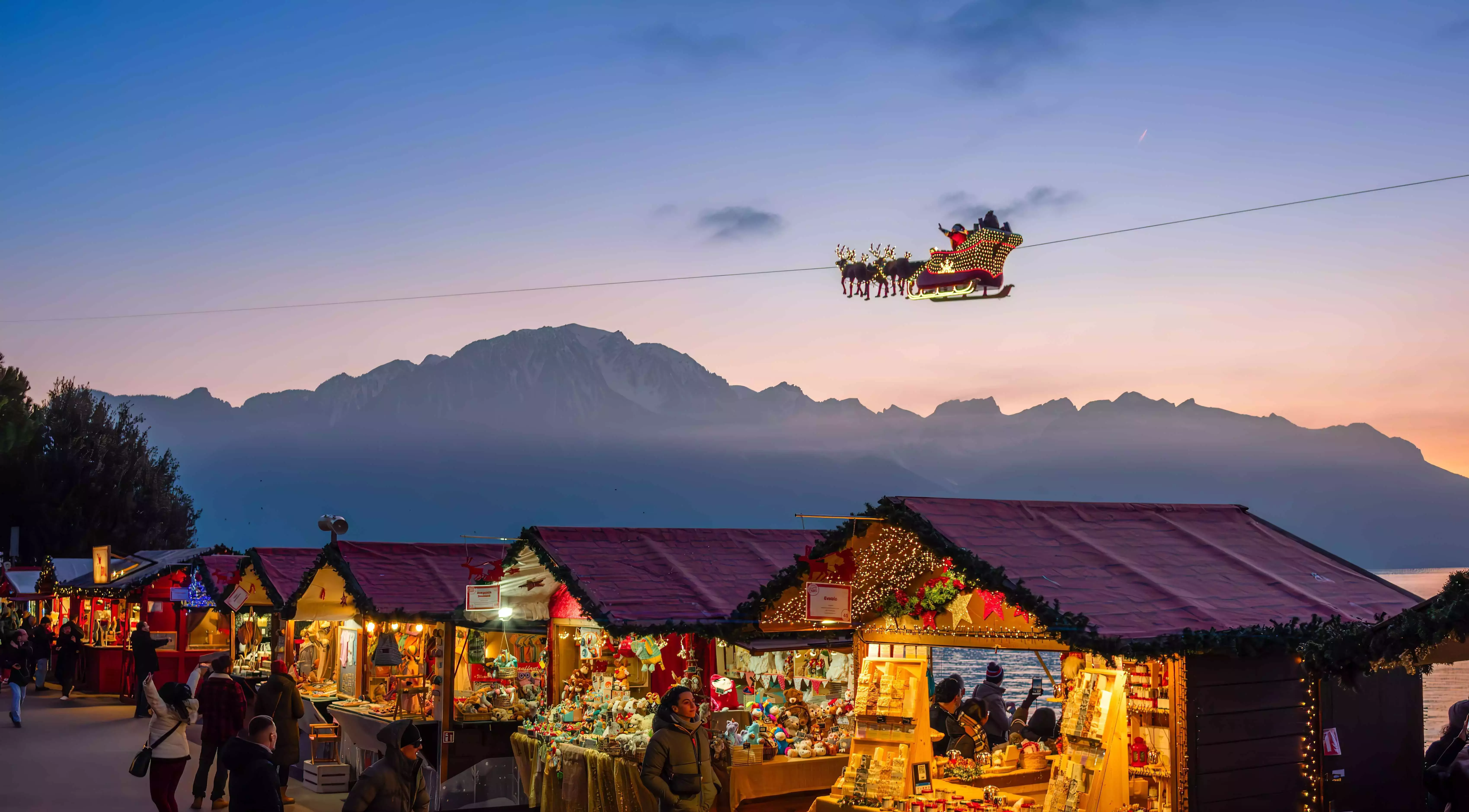 Light display and market stalls on Lake Geneva in Geneva, Switzerland.