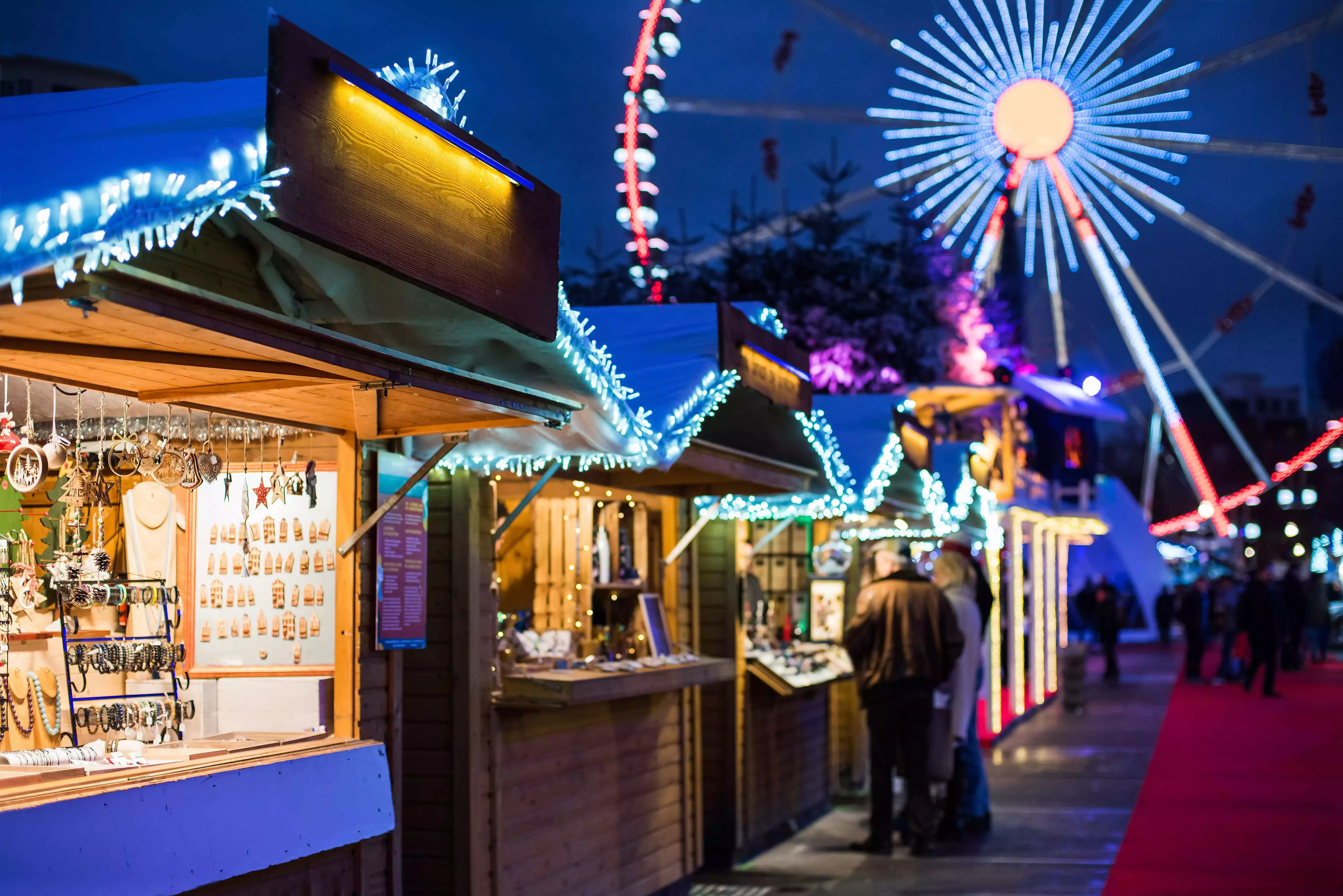 Stalls and fair ground rides at Brussels&amp;amp;#039; Christmas Market in Belgium.