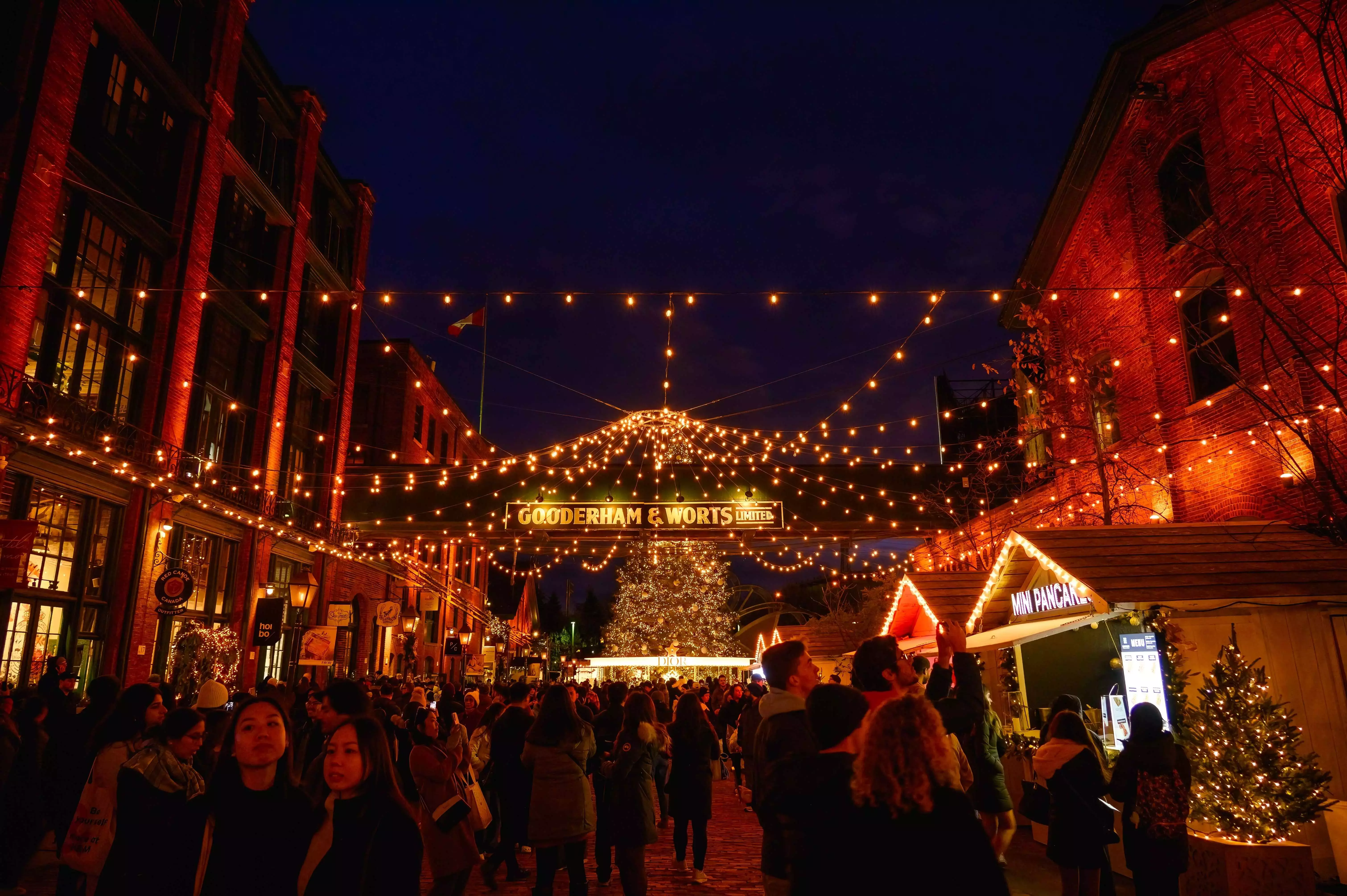 Lights and stall signs over Toronto&amp;amp;#039;s Christmas Market in Toronto, Canada.