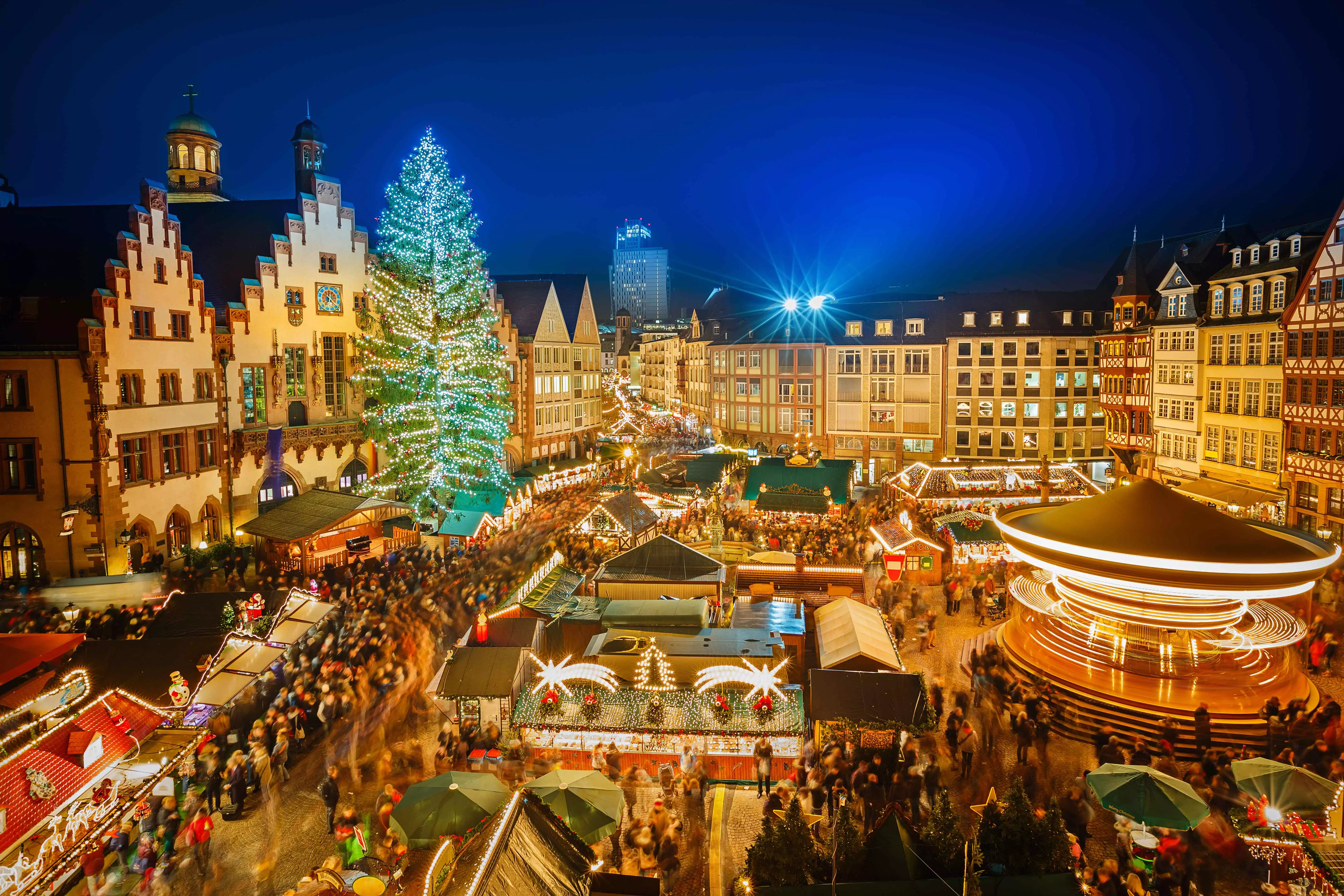 Central square with Christmas lights and market stalls in Germany