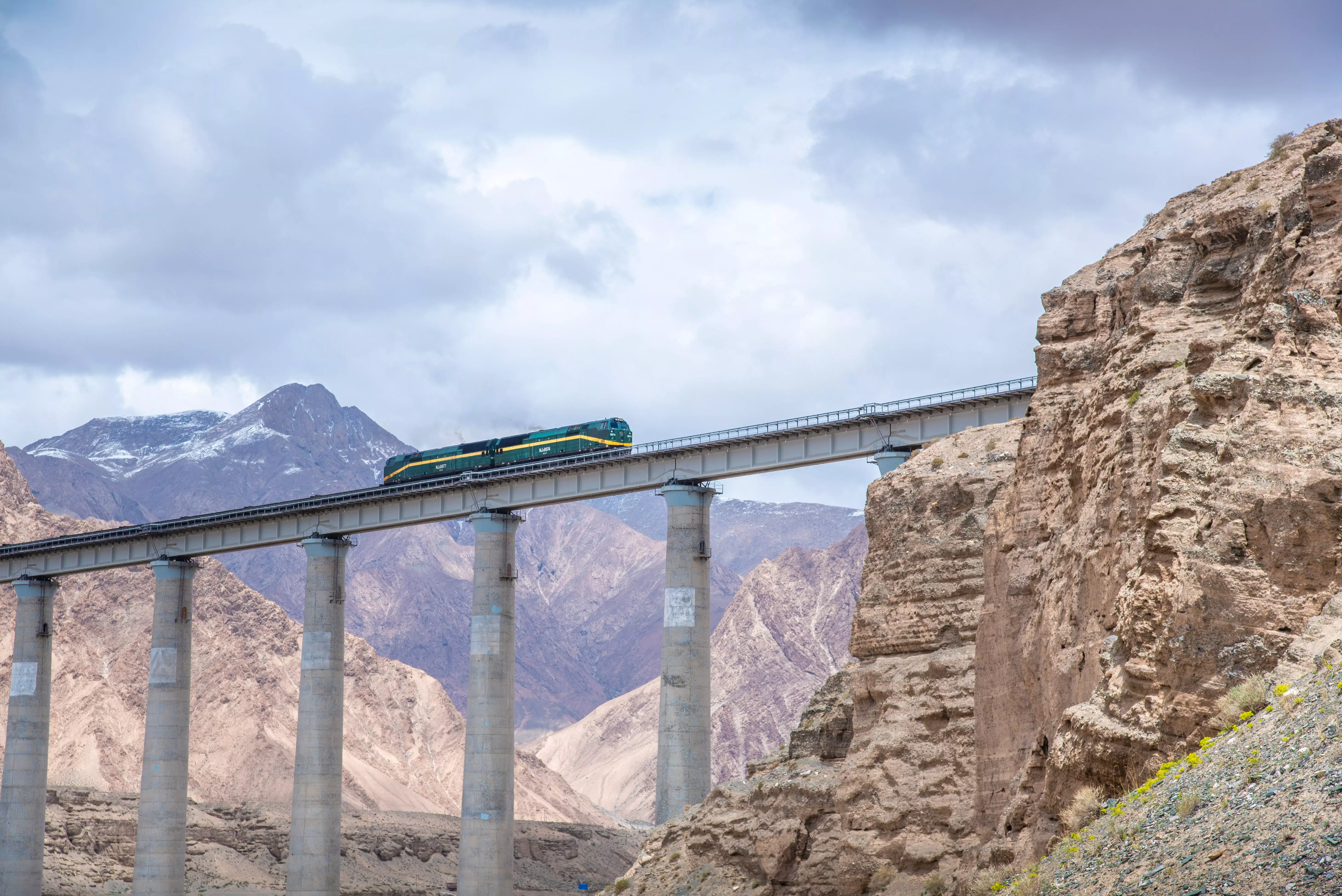 Partake in the world's highest train journey as you head through the Tibetan Plateau.