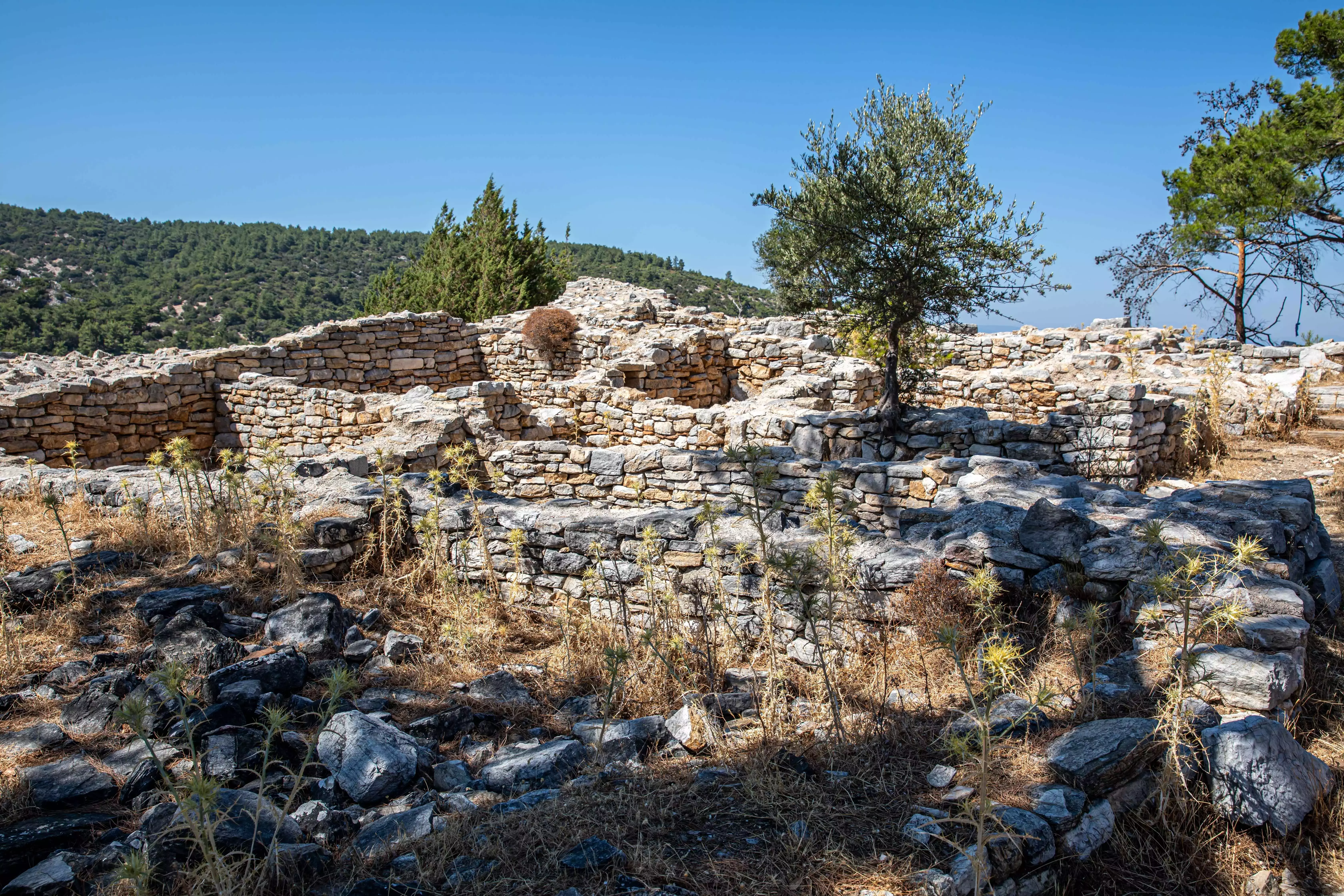A close up of a partially ruined stone wall in Bodrum,Turkey