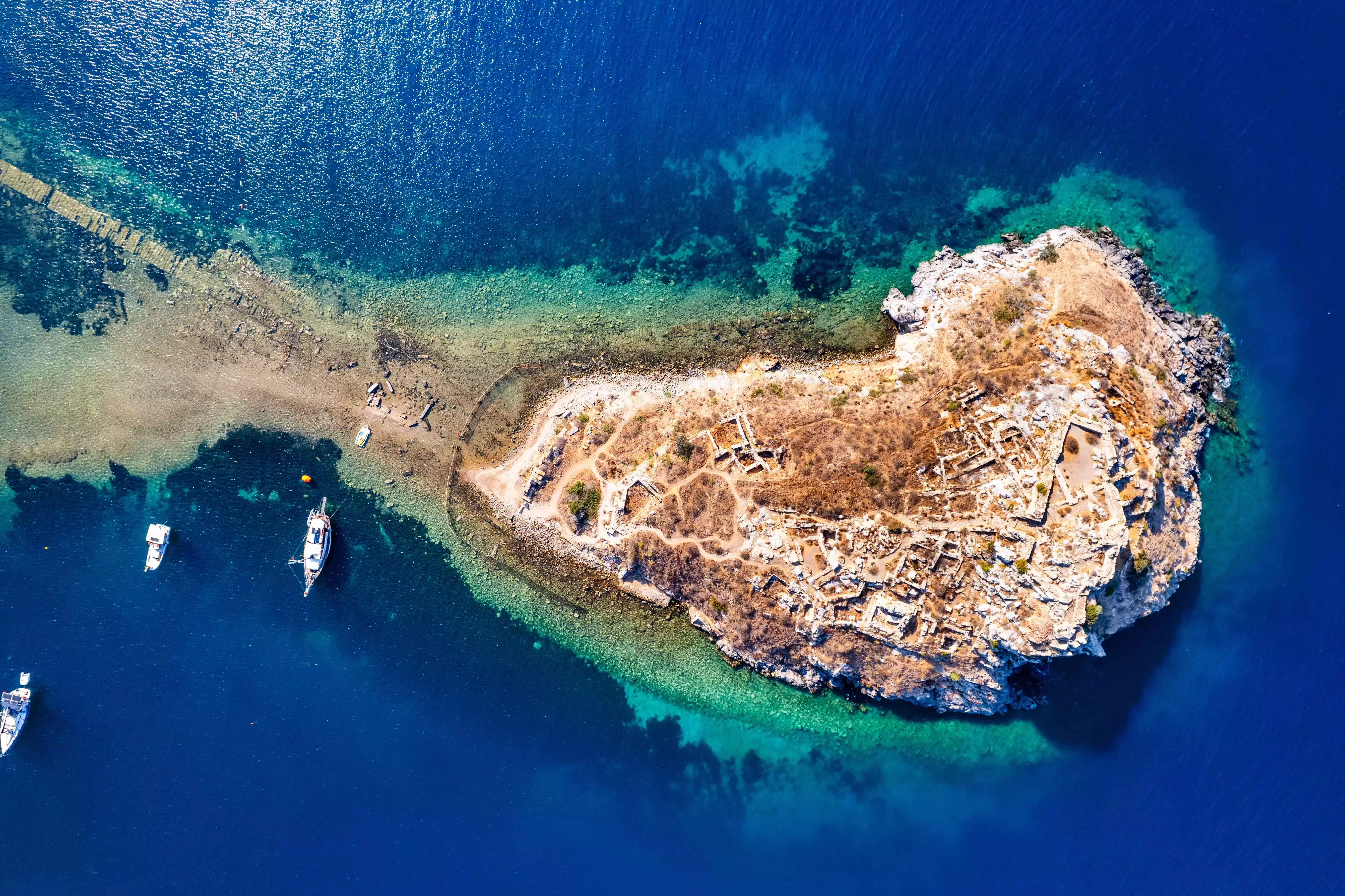 Aerial view of Rabbit Island and the connecting causeway in Bodrum, Turkey