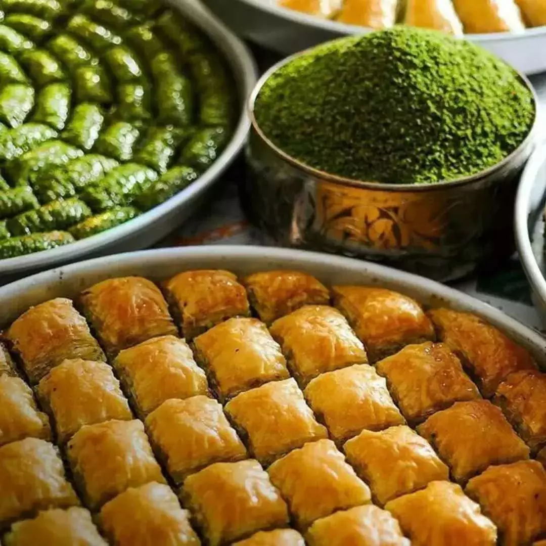 Close up of golden baklava displayed at a patisserie in Bodrum, Turkey