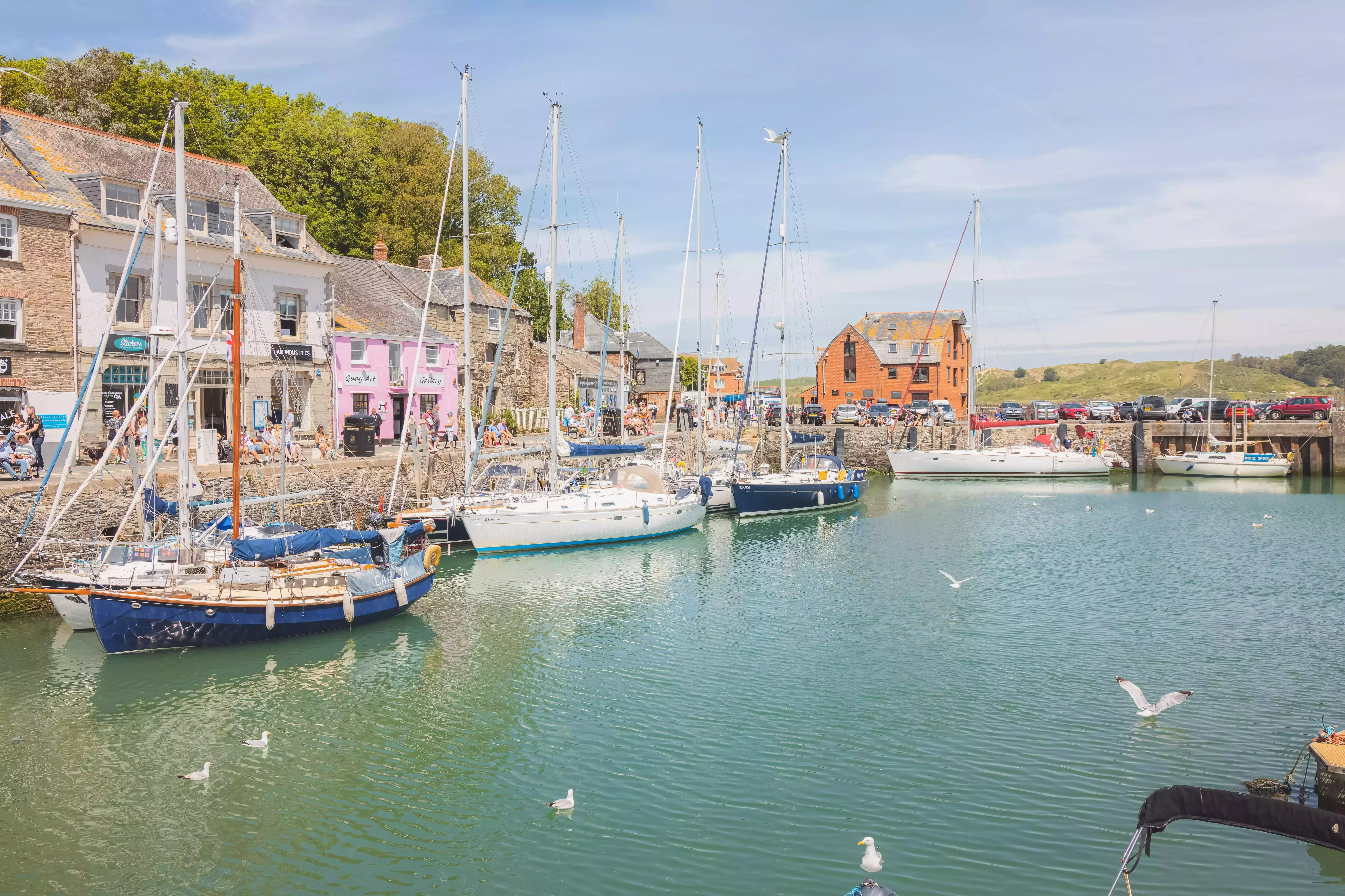 Sailboats in the harbour on a sunny day in Padstow, Cornwall