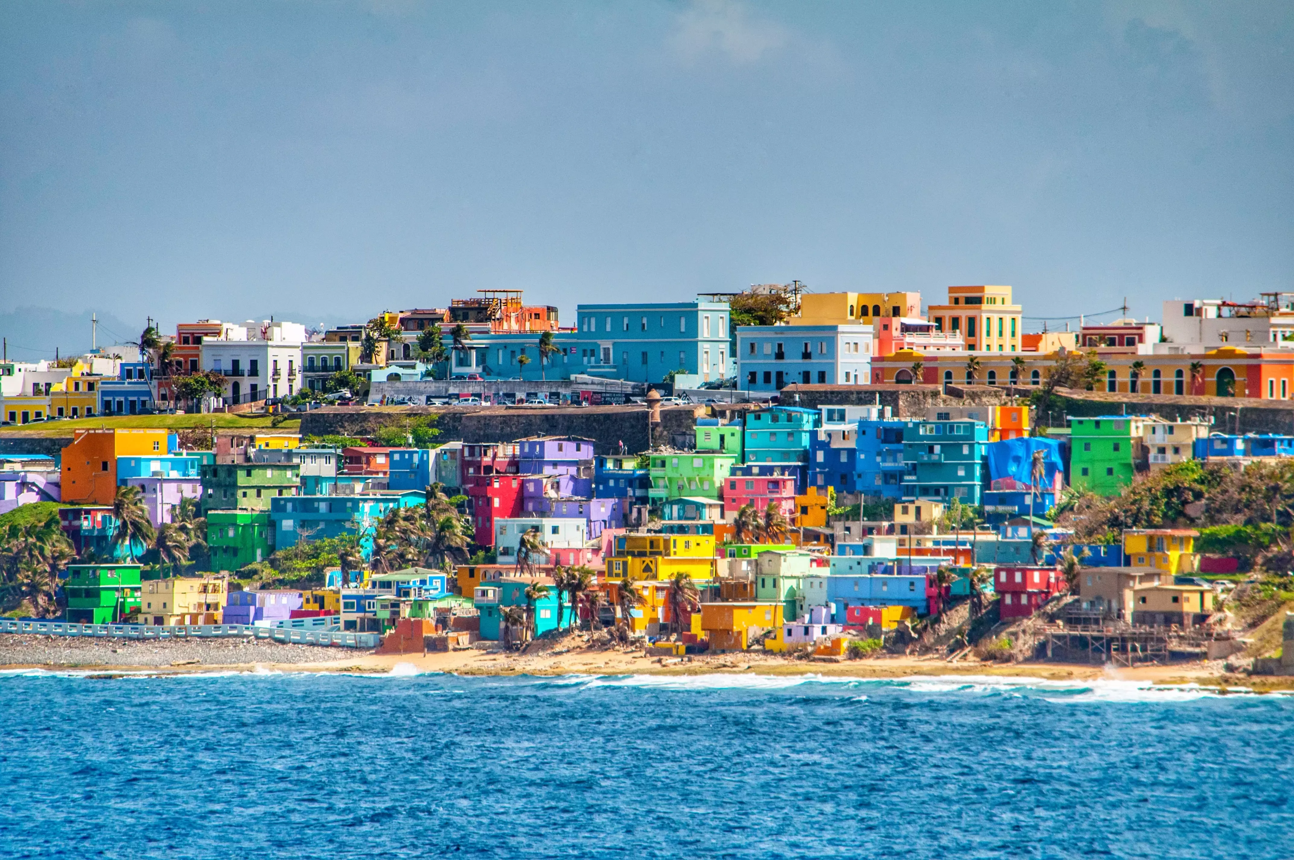 Colourful buildings behind a beach in San Juan, Puerto Rico