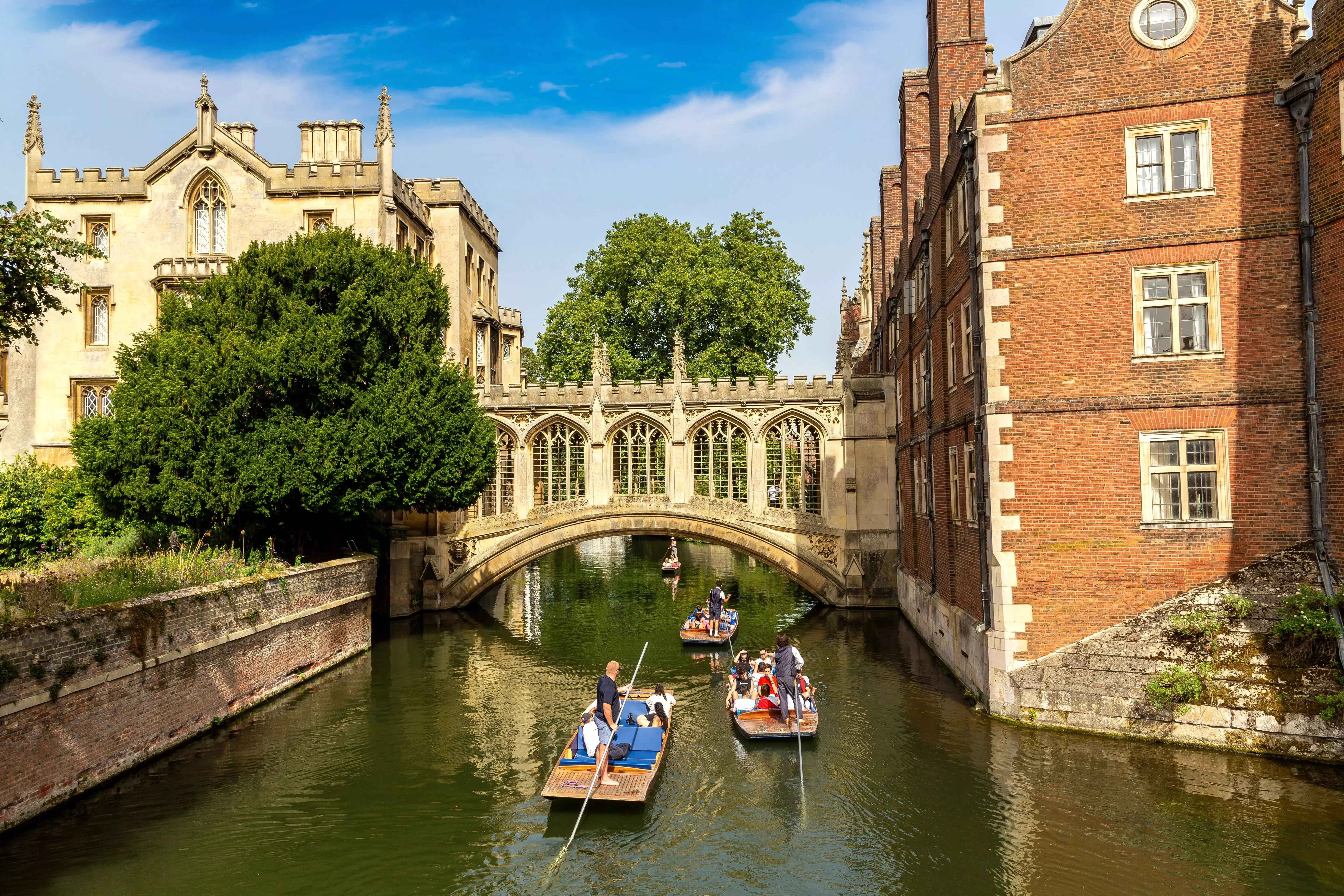 People punting on the river in Cambridge in summertime