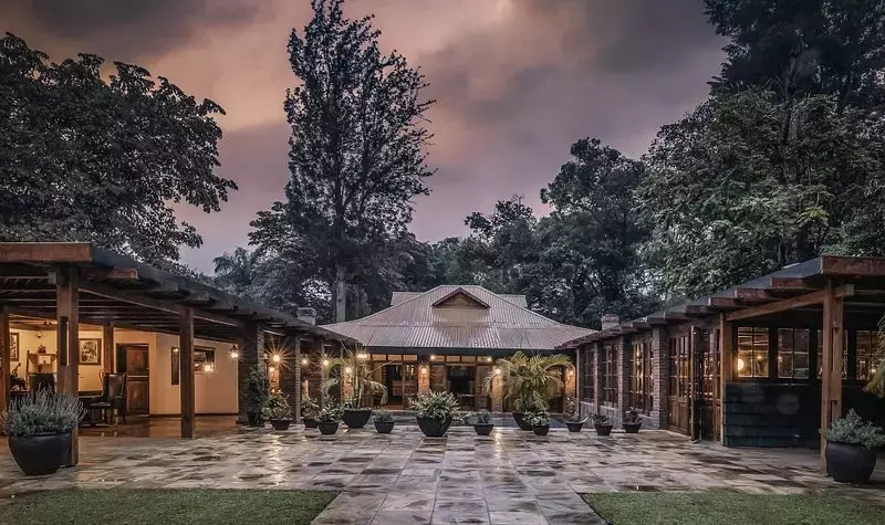 Coffee and luxury meet at Arusha Coffee Lodge in Tanzania.