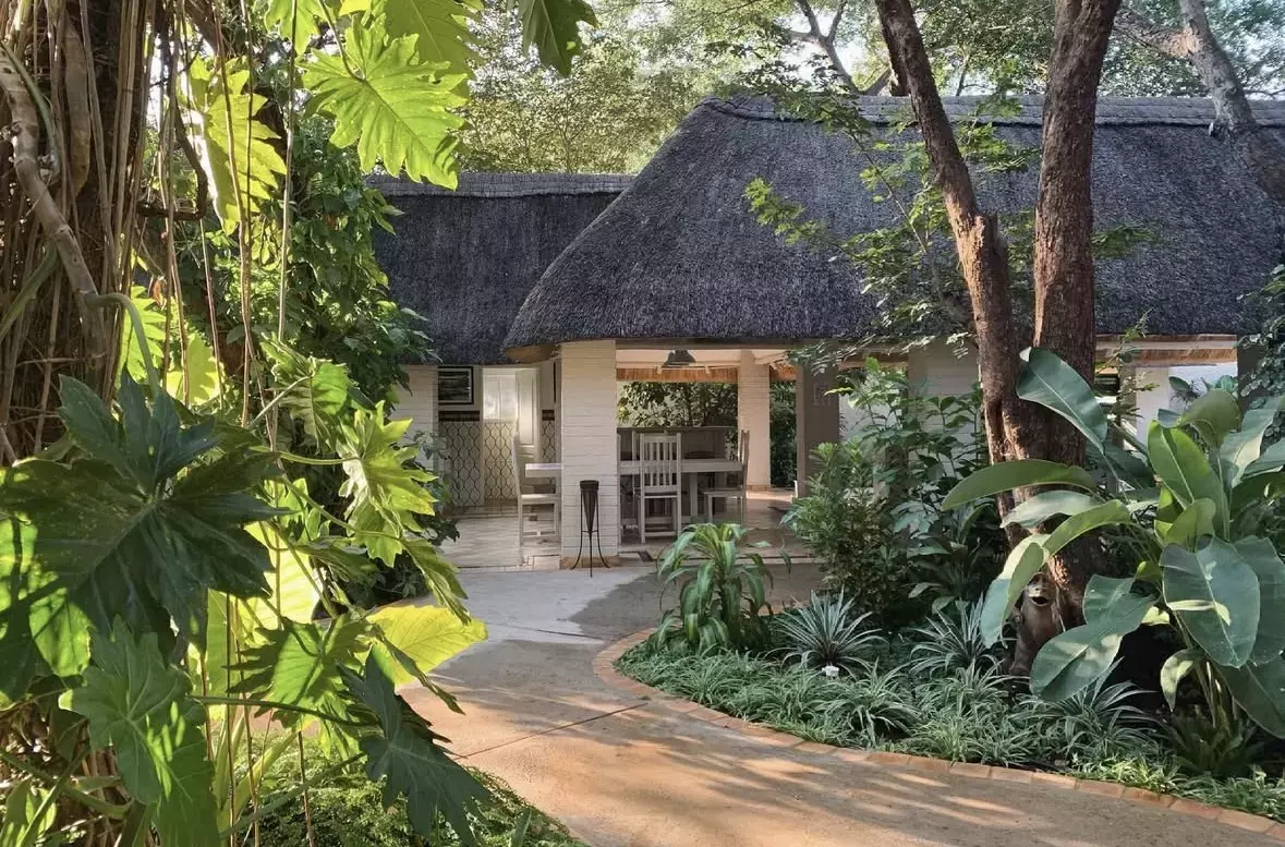 The Pamarah Lodge is surrounded by lush, tropical greenery.