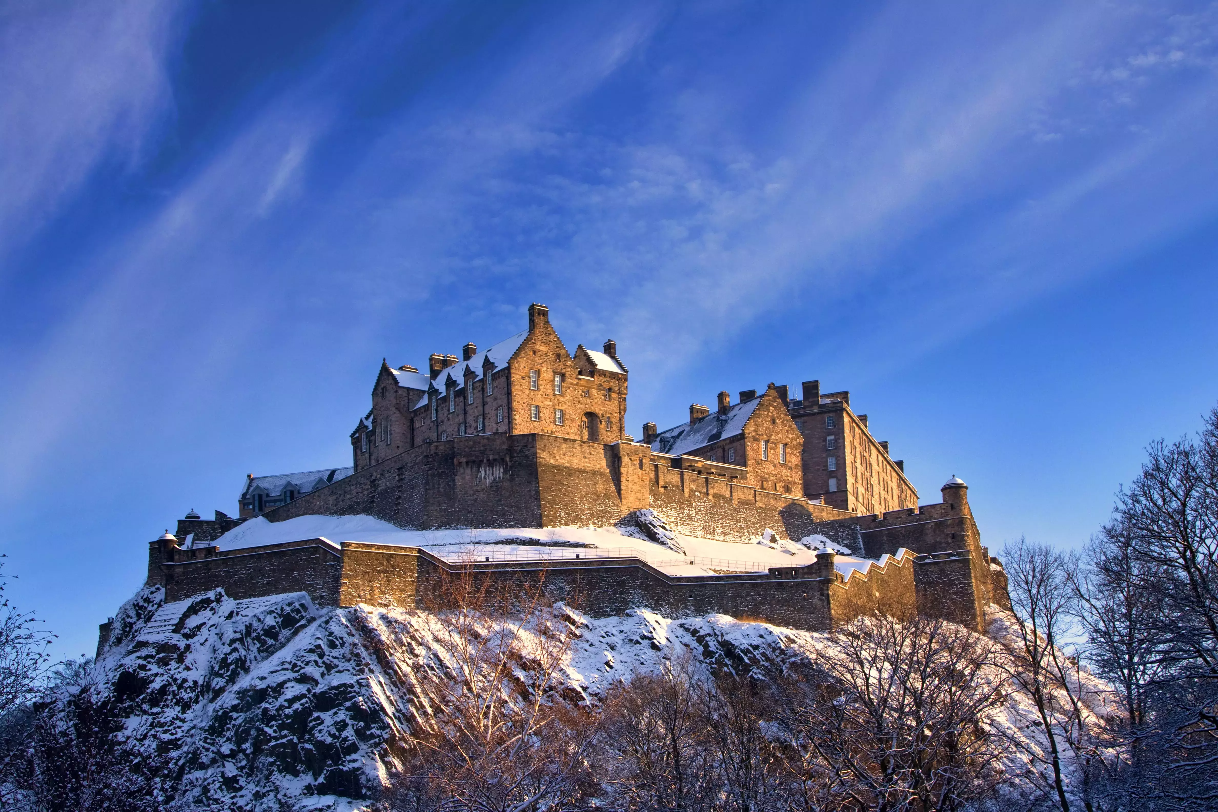 A snow-dusted Edinburgh Castle in the winter.