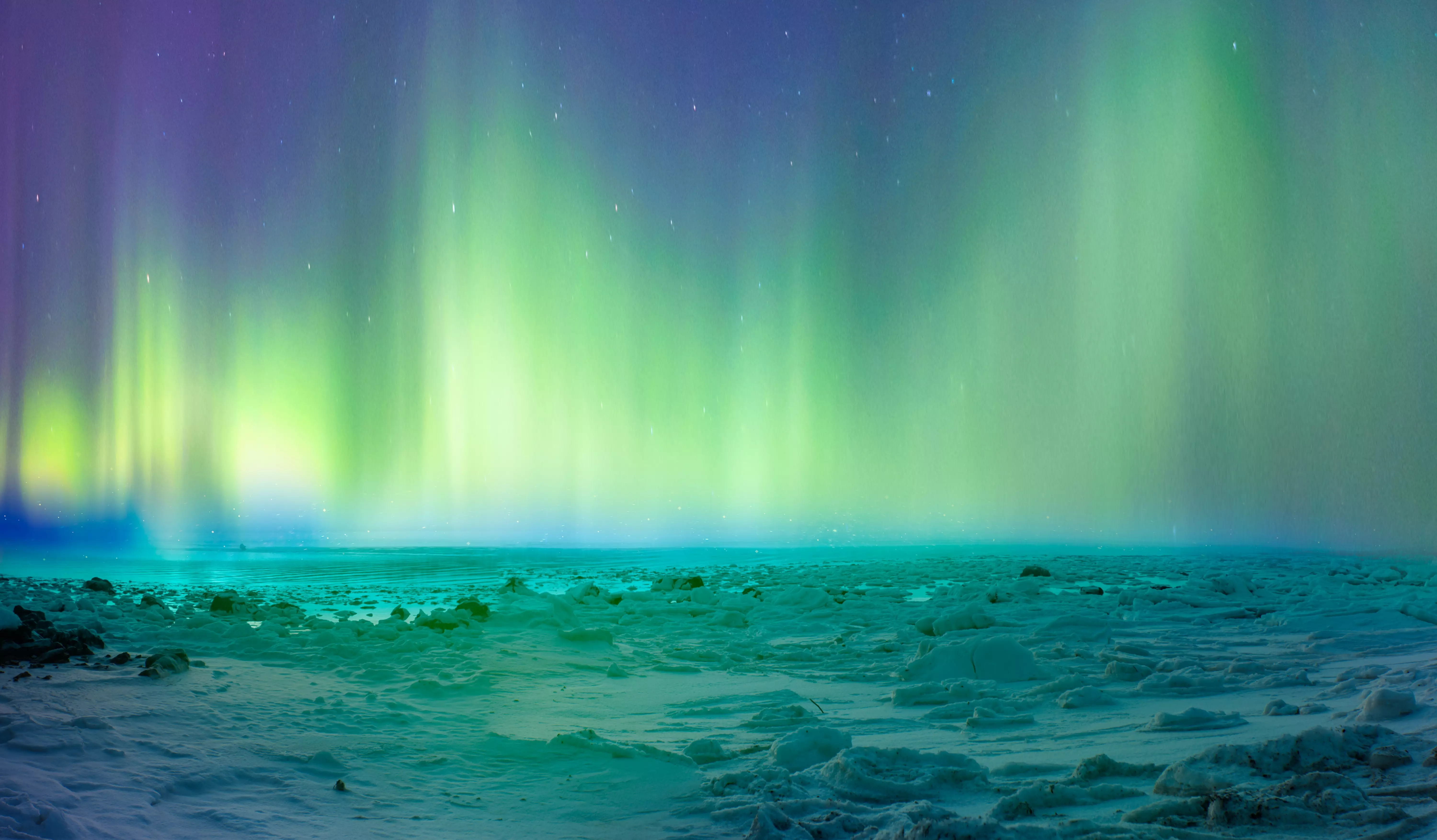 The frozen lake of Kattfjordvatnet is one of the best places in Troms&oslash; for viewing the Northern Lights.