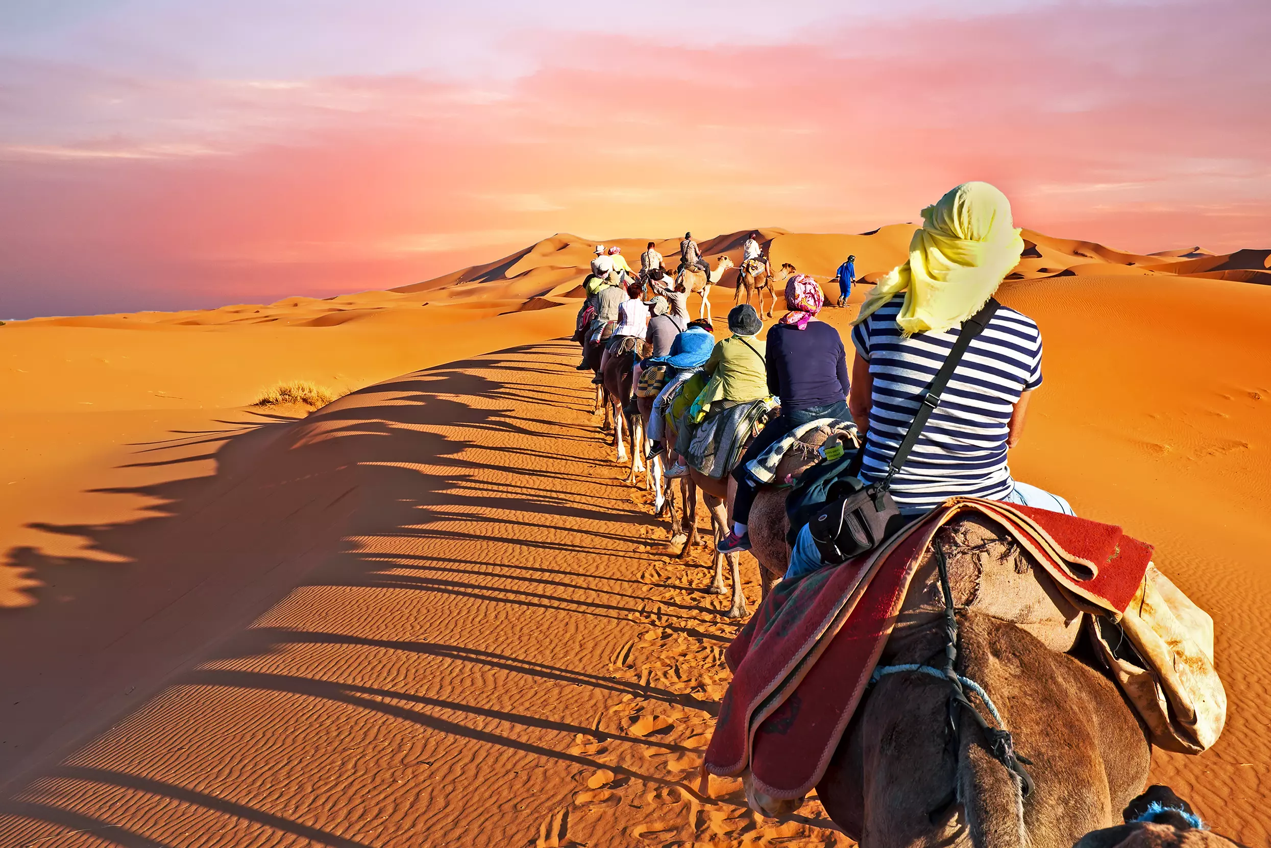 Camel trekking through the Sahara Desert is a once-in-a-lifetime experience when visiting Morocco.