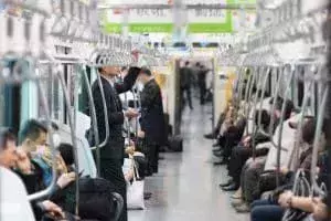 passengers travelling on the metro in tokyo