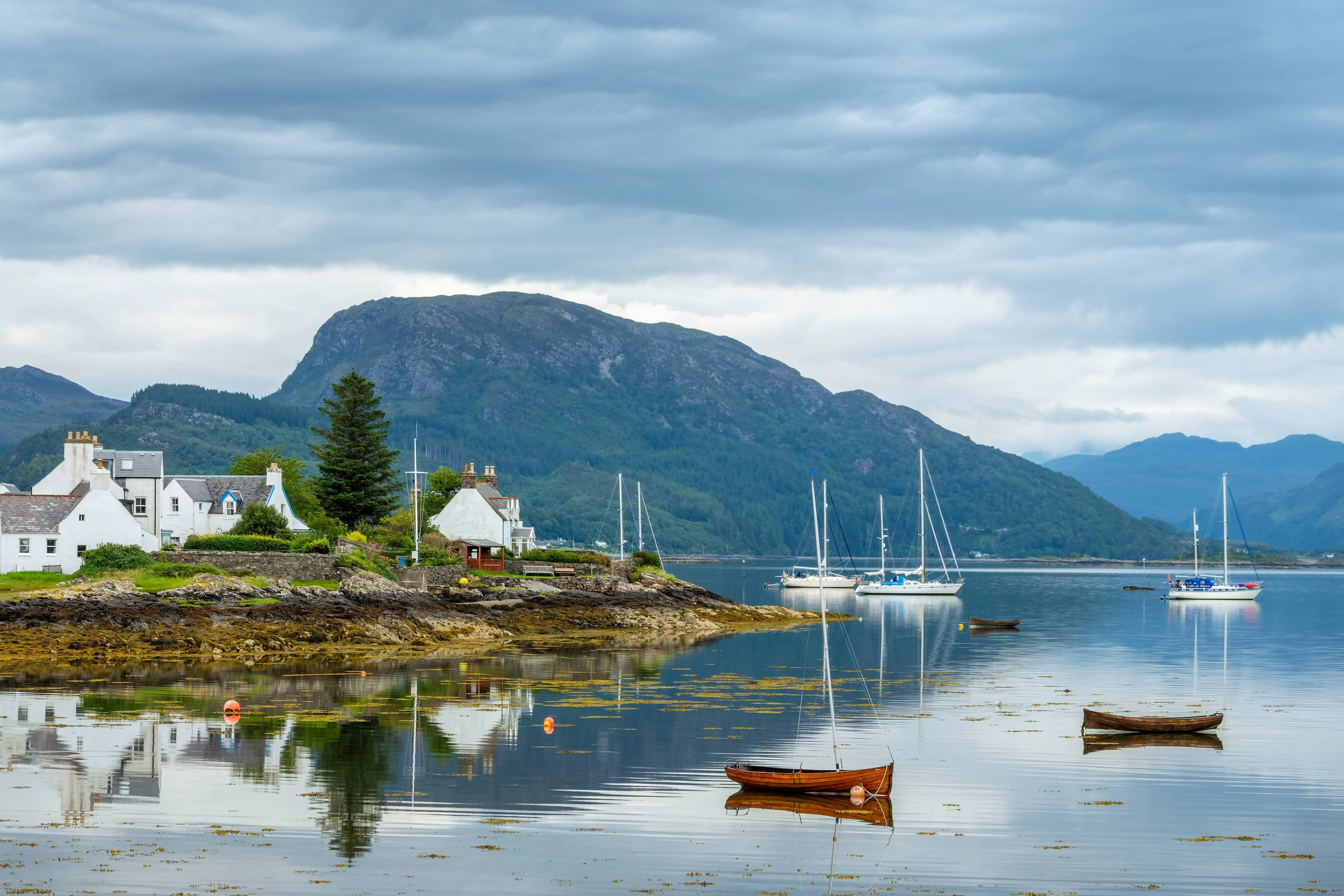 Plockton village harbour and mountains