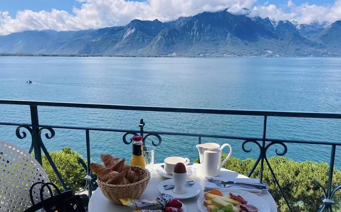 Balcony views over Lake Geneva at this beautiful Montreux hotel, Switzerland.