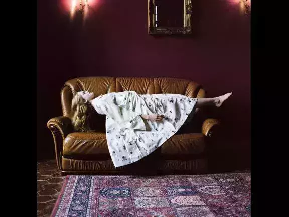 Chromogenic print of a floating girl by Hellen van Meene