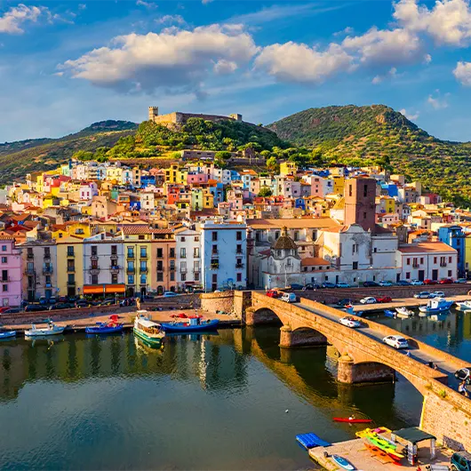 A scenic view of village of Bosa