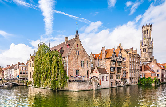 Belfry tower and famous canal in Bruges