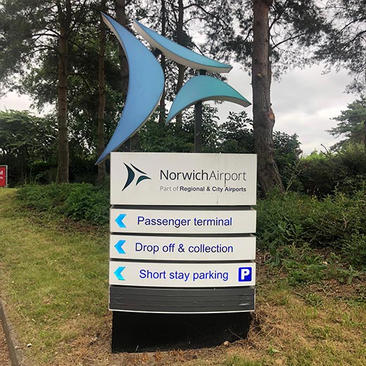 Norwich Airport car hire sign post