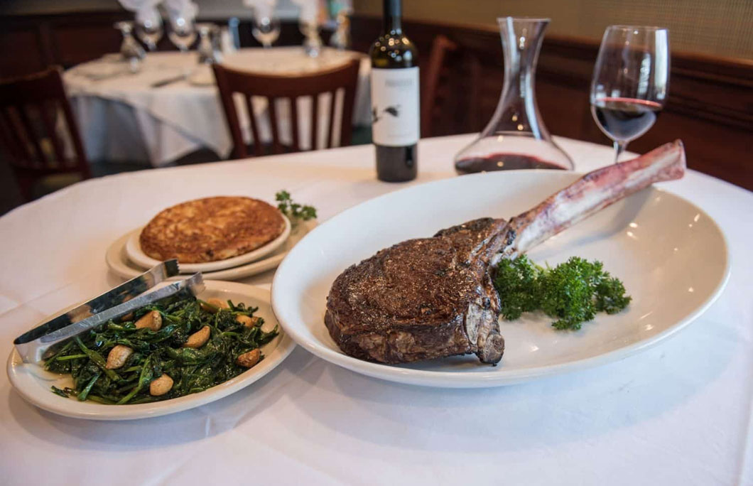 Best steakhouses new jersey the river palm t-bone steak on a plate