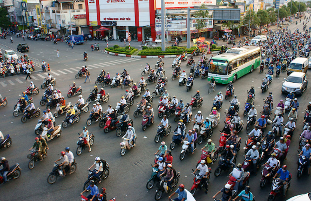 The yellow traffic light in Ho Chi Minh means ‘drive faster’