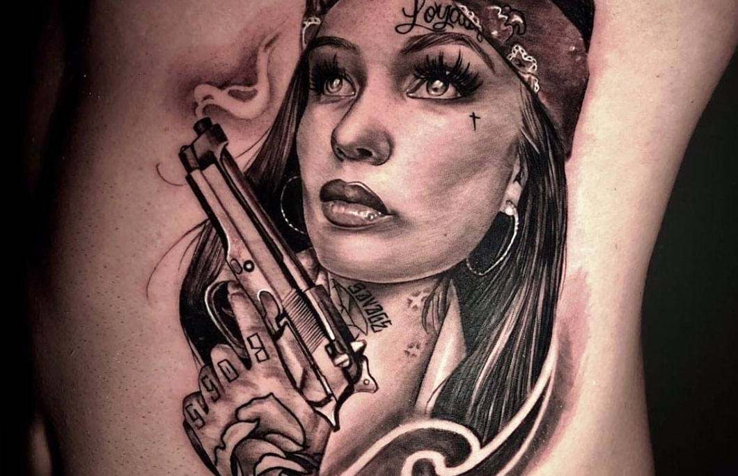 private girl gun tattoos