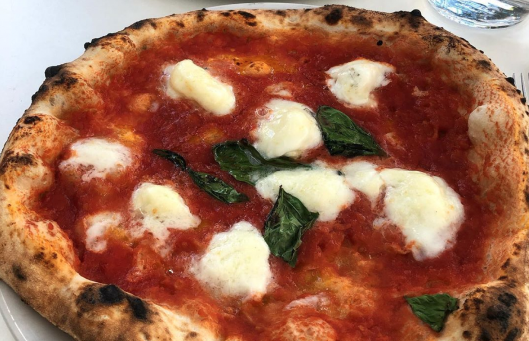 Where does Neapolitan pizza originate?